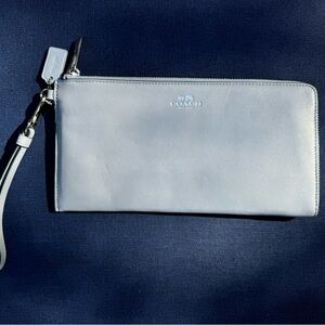 Coach leather clutch/wallet on a strap, pale blue